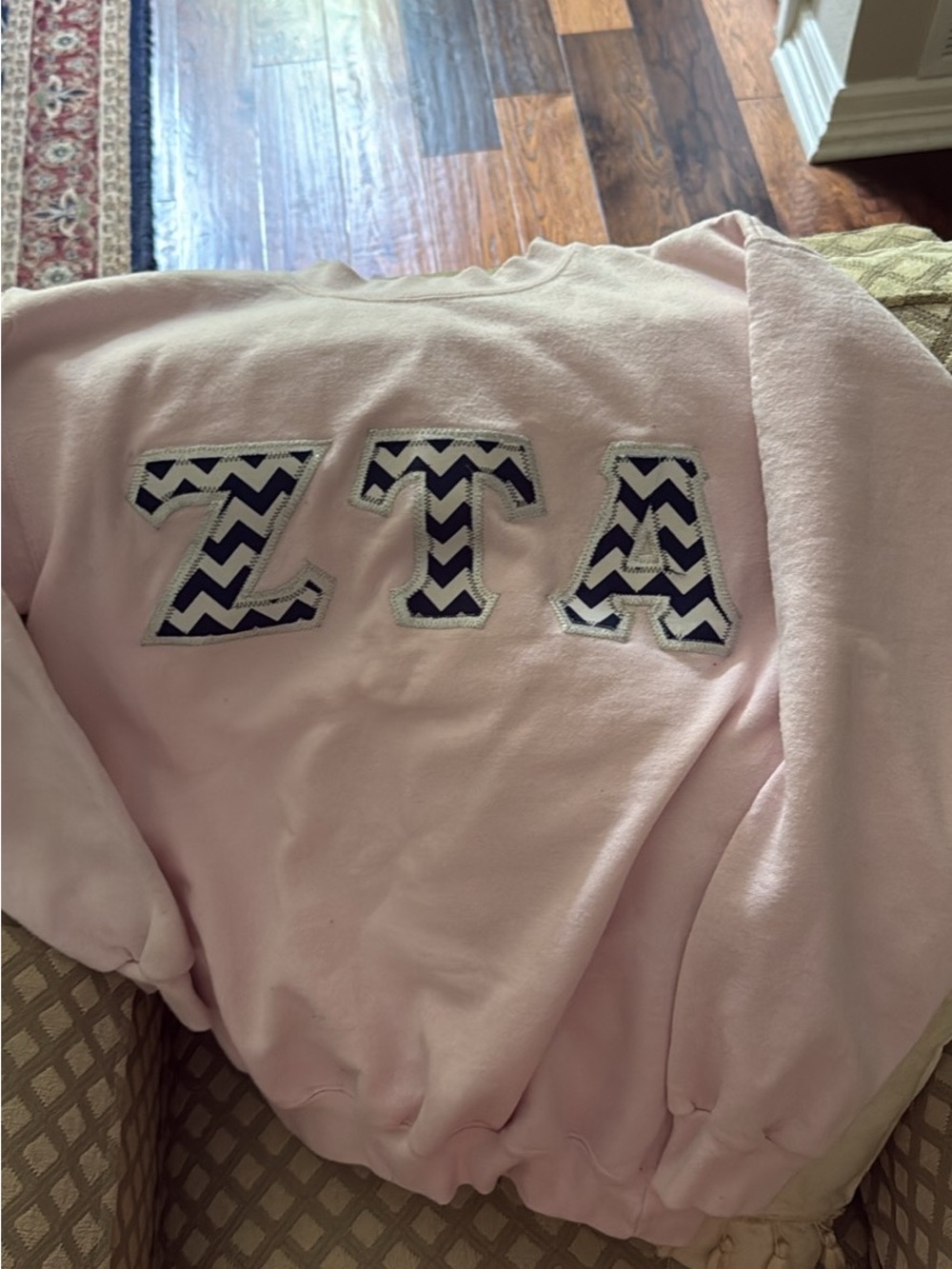 Pink Zeta Tau Alpha (ZTA) Appliqué Sweatshirt. Letters are stitched on
